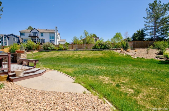 9688 Chesapeake St, Highlands Ranch, CO 80126 - view of yard with a wooden deck and a fenced backyard