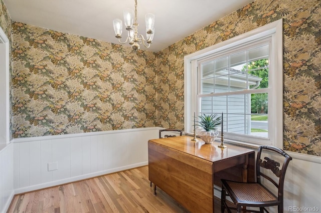 3225 S Race St, Englewood, CO 80113 - office area featuring wood finished floors, wainscoting, wallpapered walls, and a chandelier
