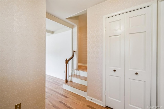 3225 S Race St, Englewood, CO 80113 - stairs with wood finished floors and wallpapered walls
