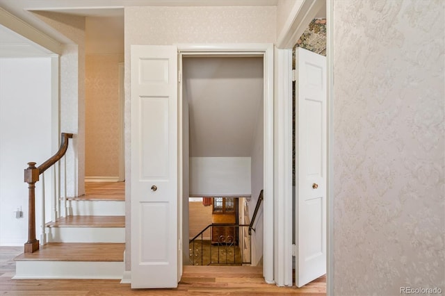 3225 S Race St, Englewood, CO 80113 - staircase with wood finished floors and wallpapered walls