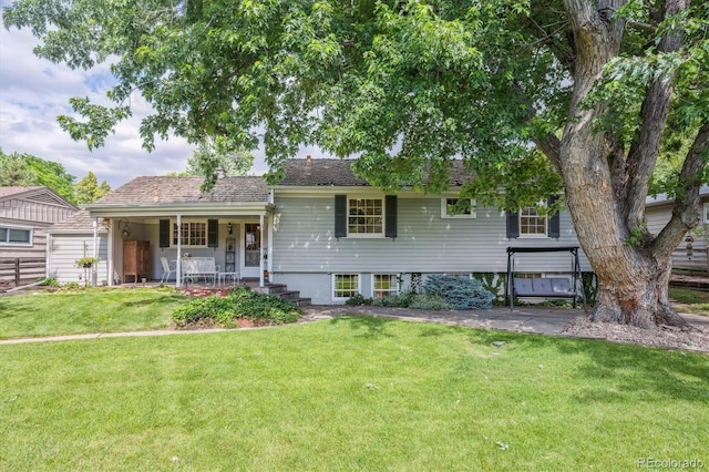 3225 S Race St, Englewood, CO 80113 - ranch-style house featuring covered porch and a front yard