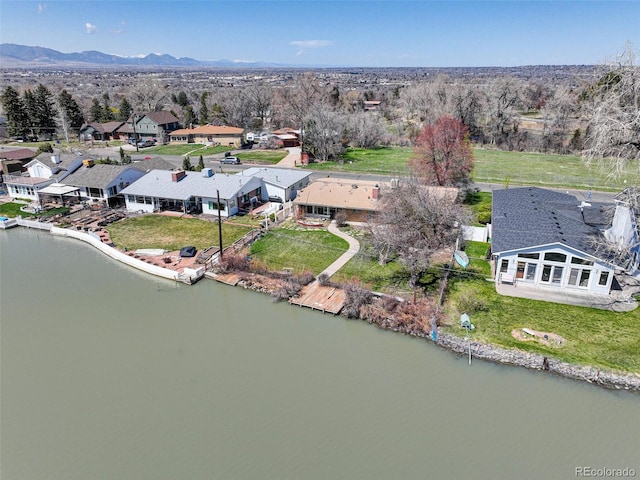 bird's eye view featuring a water and mountain view