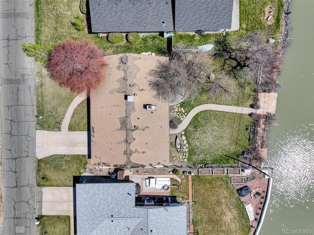 drone / aerial view featuring a water view