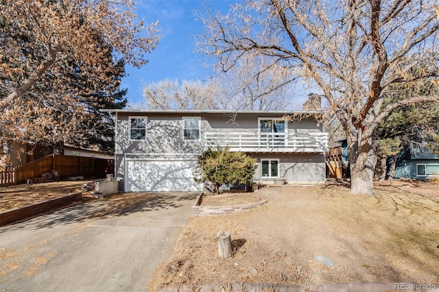 raised ranch featuring a garage