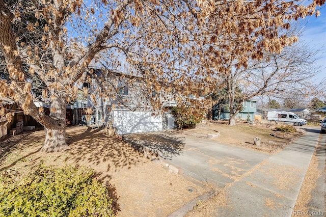 view of property exterior featuring a garage