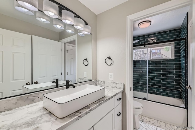 6040 W 75th Dr, Arvada, CO 80003 - bathroom featuring vanity, enclosed tub / shower combo, and tile patterned floors
