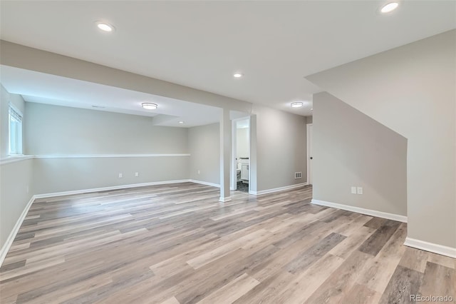 6040 W 75th Dr, Arvada, CO 80003 - basement featuring light wood finished floors and recessed lighting