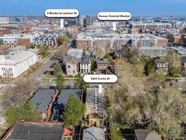 birds eye view of property featuring a view of city