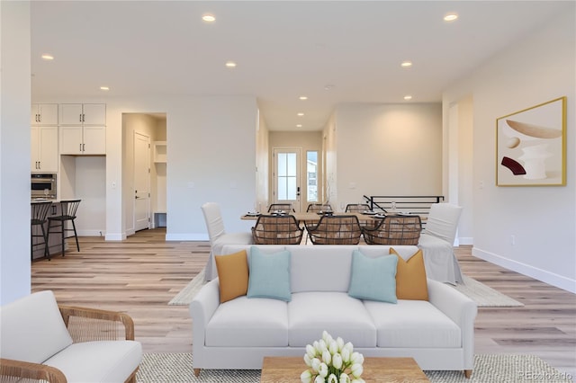 living room featuring light wood-type flooring