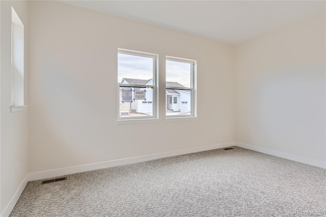 view of carpeted spare room