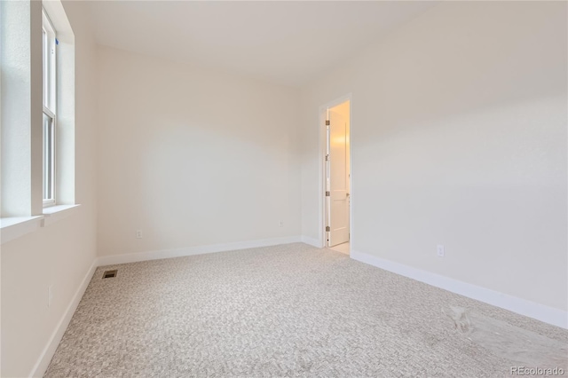 view of carpeted spare room