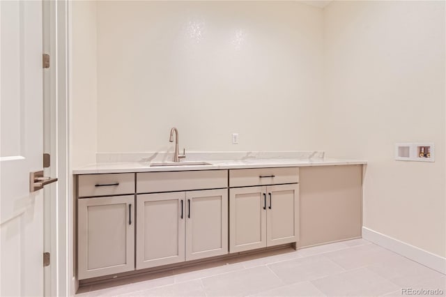 bathroom featuring tile patterned floors and vanity