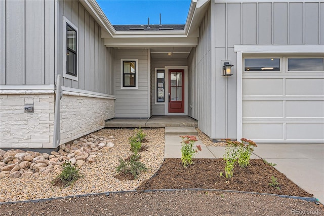 doorway to property featuring a garage