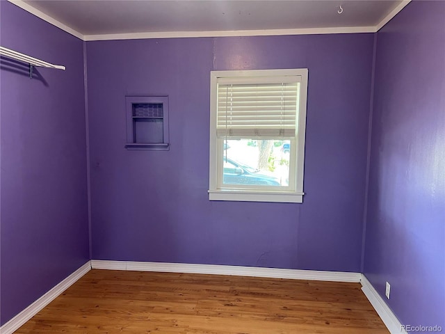 unfurnished room featuring wood-type flooring