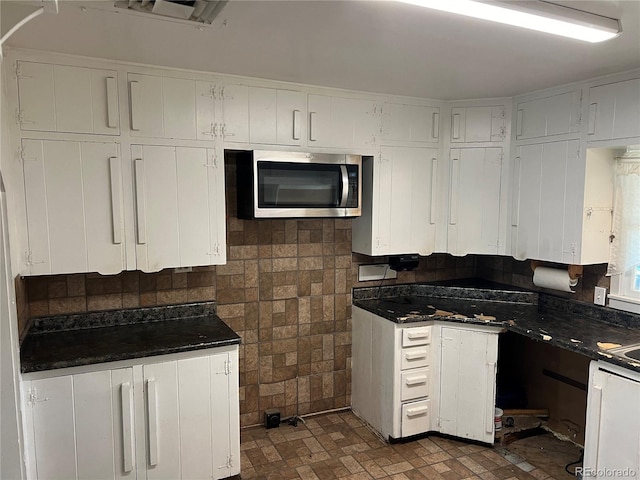 kitchen with white cabinetry