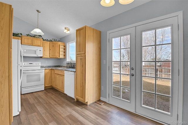 kitchen with white appliances, hanging light fixtures, french doors, light brown cabinetry, and light wood finished floors