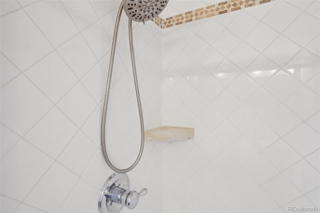 details featuring a tile shower