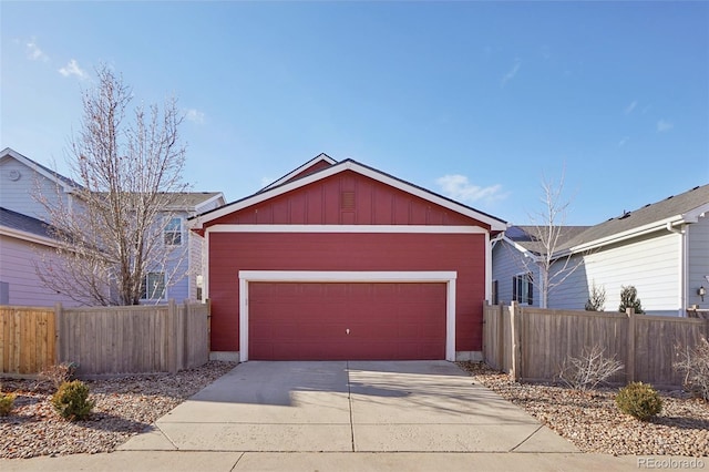 exterior space featuring an outbuilding and a garage