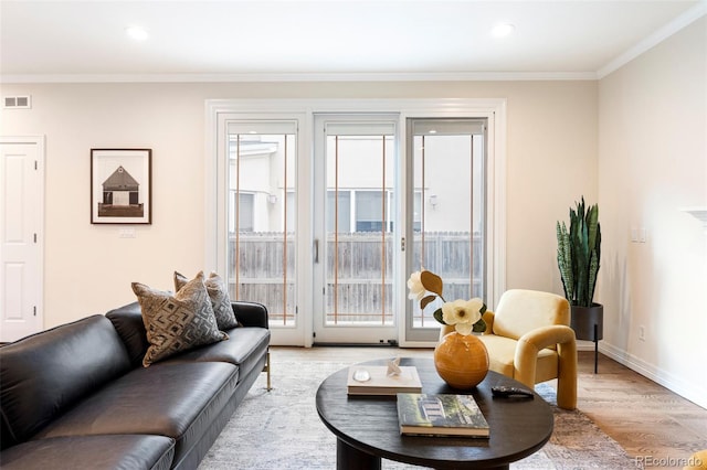 538 Cook St, Denver, CO 80206 - living area featuring light wood-style floors, ornamental molding, and recessed lighting