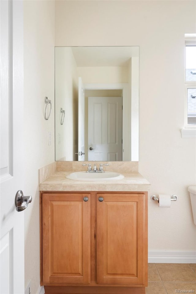 538 Cook St, Denver, CO 80206 - bathroom with vanity and tile patterned floors