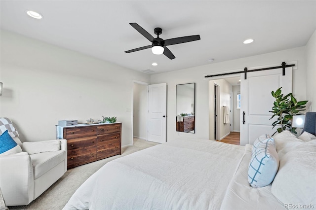 21 N Edge Cliff St, Castle Rock, CO 80104 - bedroom featuring recessed lighting, a barn door, and ceiling fan