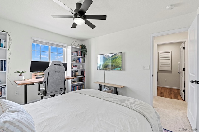 21 N Edge Cliff St, Castle Rock, CO 80104 - bedroom with a ceiling fan, carpet, an office area, and baseboards