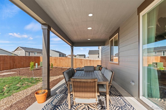 21 N Edge Cliff St, Castle Rock, CO 80104 - view of patio / terrace featuring a fenced backyard and outdoor dining area