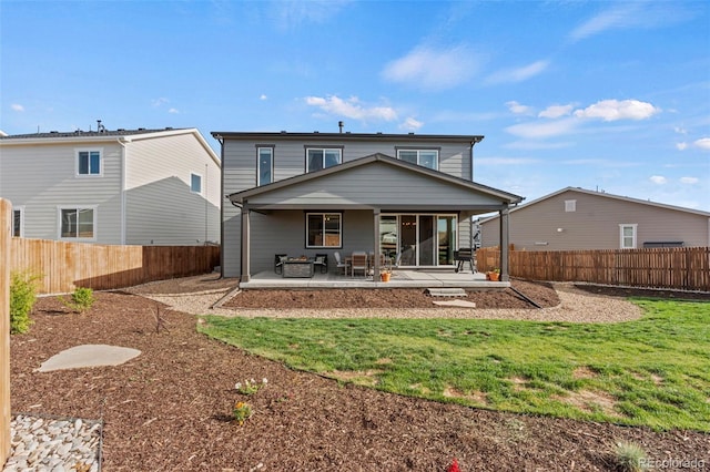 21 N Edge Cliff St, Castle Rock, CO 80104 - rear view of house with a patio area