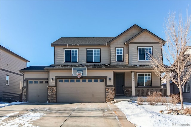 craftsman-style home featuring a garage and a porch