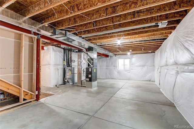 basement with heating unit and gas water heater