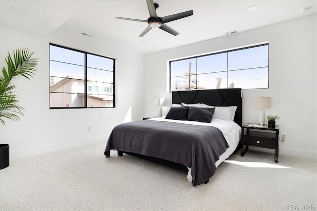 bedroom with ceiling fan and carpet