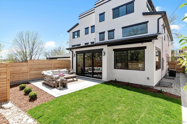 rear view of property with central AC unit, an outdoor hangout area, a lawn, and a patio area