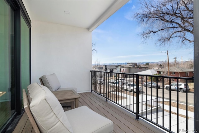 balcony featuring a residential view