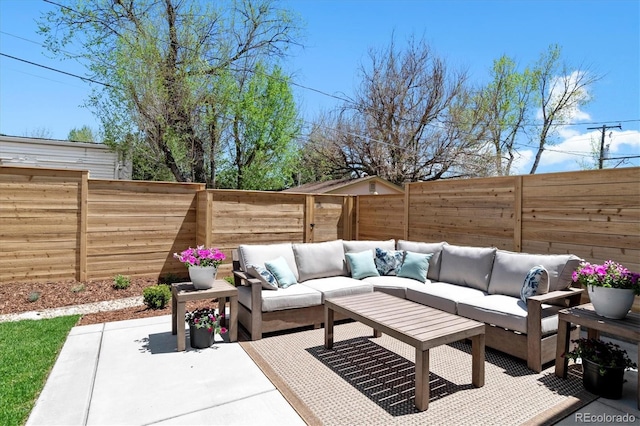 view of patio with an outdoor hangout area and a fenced backyard