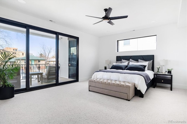 carpeted bedroom featuring baseboards, visible vents, a ceiling fan, and access to exterior