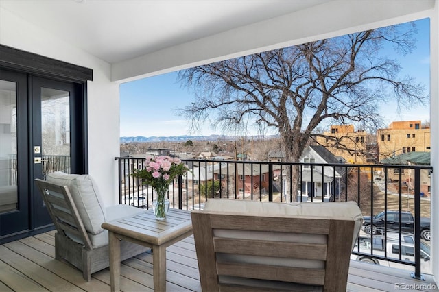 wooden terrace featuring a mountain view