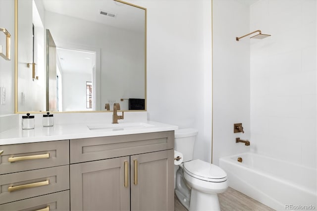 full bath featuring visible vents, shower / bathing tub combination, toilet, and vanity