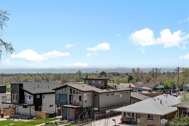 aerial view featuring a residential view and a mountain view