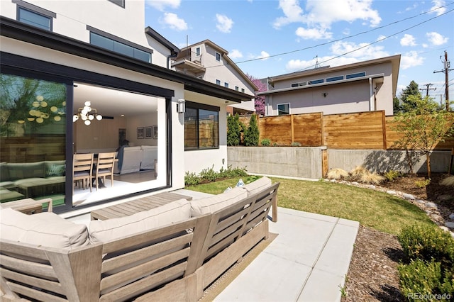 view of patio / terrace with fence and an outdoor hangout area