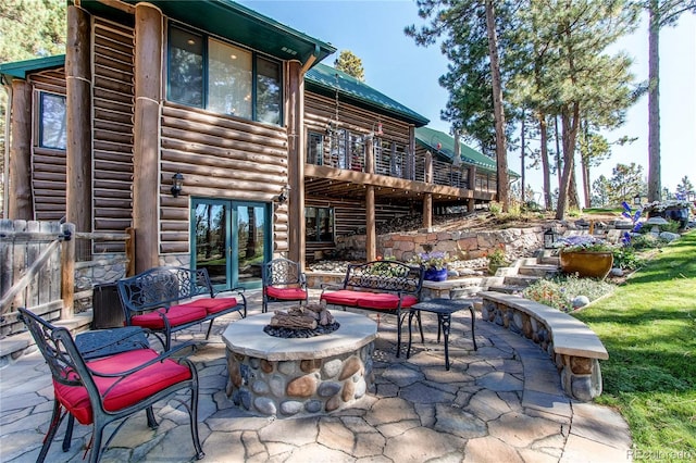 view of patio featuring an outdoor fire pit