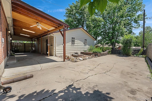 920 Emerson Cir, Northglenn, CO 80233 - fenced backyard featuring ceiling fan and a patio