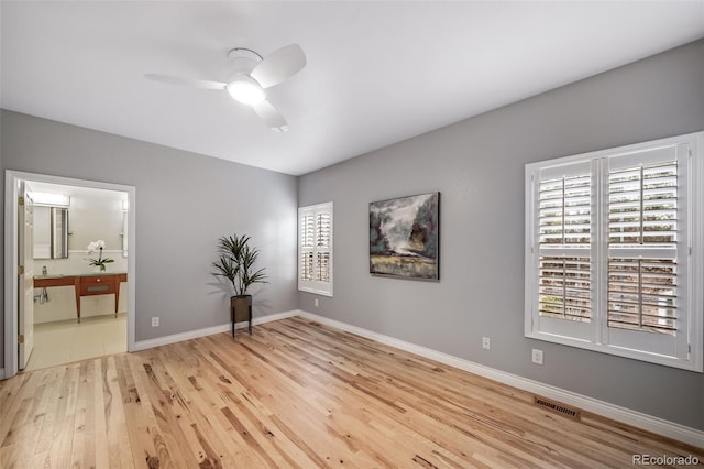 interior space featuring ceiling fan and light hardwood / wood-style flooring