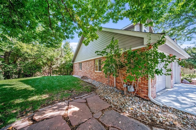 view of home's exterior with a yard