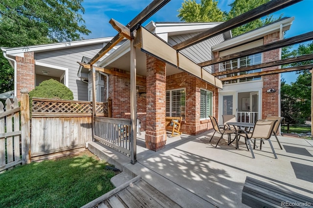 rear view of property with a patio area