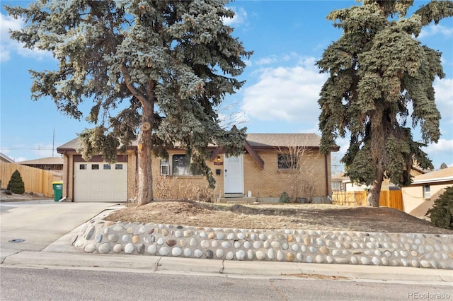 ranch-style home with a garage