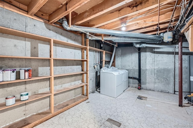 basement featuring separate washer and dryer