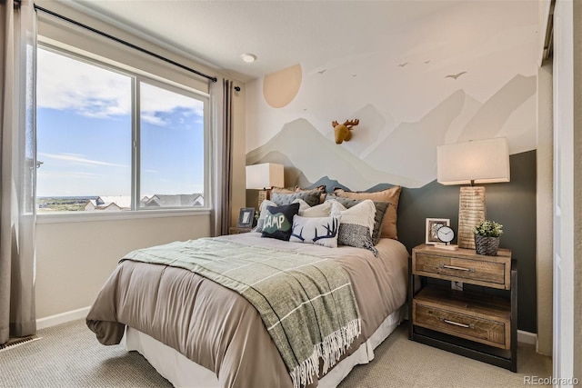 bedroom featuring light colored carpet