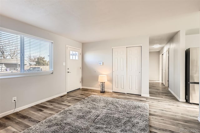 entrance foyer with hardwood / wood-style flooring