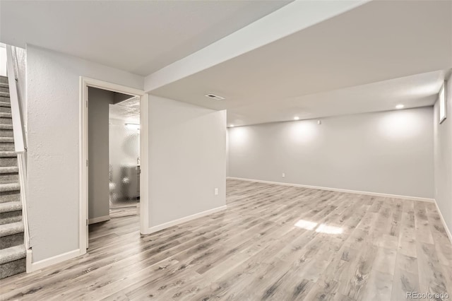 basement with light wood-type flooring