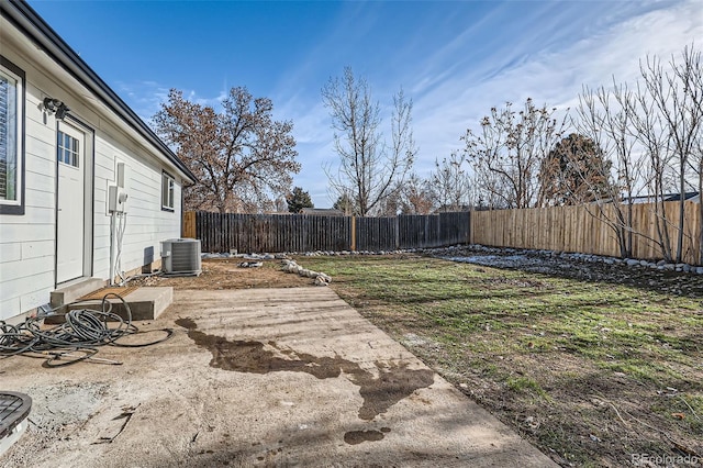 view of yard with central AC